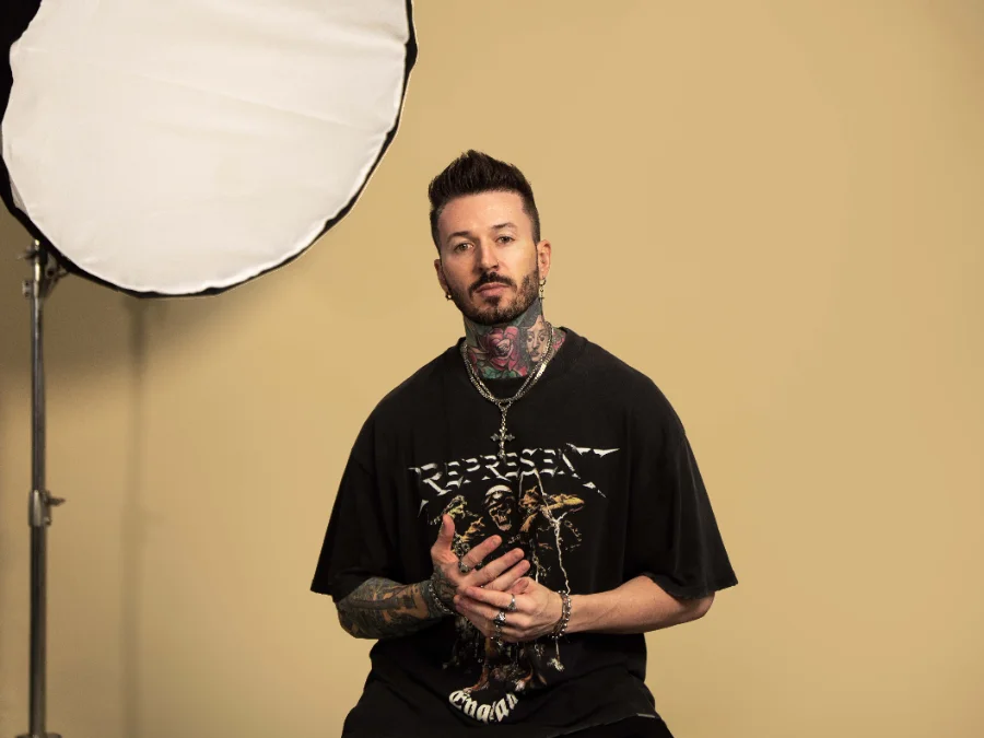 Studio portrait on a cream backdrop